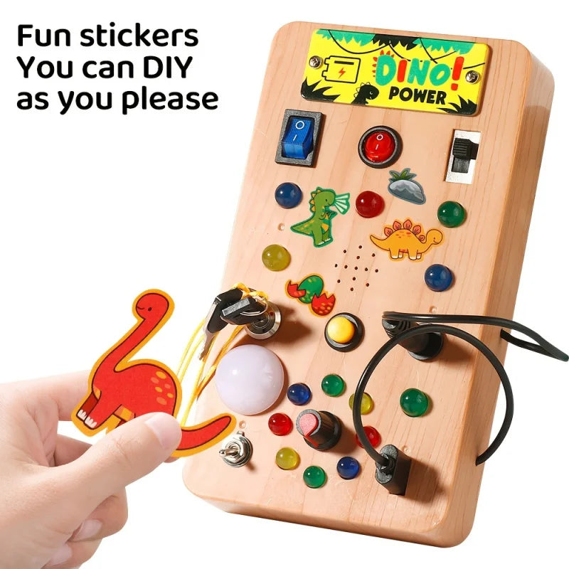 Montessori LED Light Busy Board Simulator with Switch and Dinosaur Sound Effects: A smart educational toy suitable for toddlers.